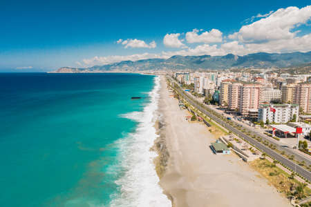 Aerial view of the Antalya city. Mediterranean sea, and the coast of Antalya. Mountains and sky in the background. Turkeyの写真素材