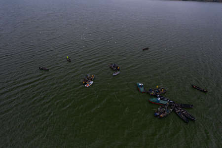 Fishing boats, floating the calm waters and going for fishing