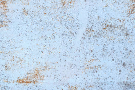 Painted in white old cracked metal rusted background. Metal rust texture. Erosion metal. Scratched...