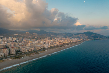 Aerial view of the Antalya city. Mediterranean sea, and the coast of Antalya. Mountains and sky in the background. Turkeyの写真素材