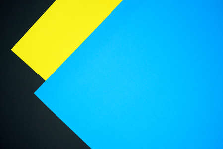 Blue, black and yellow three tone color paper background with stripes. Abstract background modern...