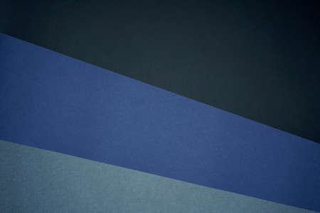 Blue, gray, black three tone color paper background with stripes. Abstract background modern hipster futuristic. Texture designの写真素材