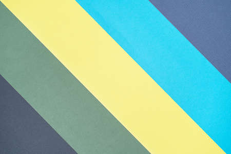 Blue, yellow, black, green, five tone color paper background with stripes. Abstract background modern hipster futuristic. Texture designの写真素材