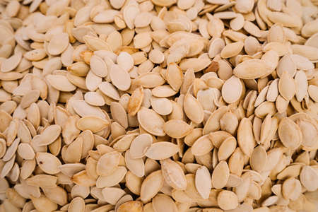 Pumpkin seeds as an abstract background texture