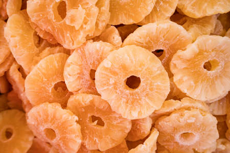 Dried pineapple as an abstract background texture