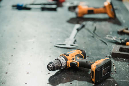 Workshop scene. Tools lying on metallic table in the workshop, garage styleの写真素材