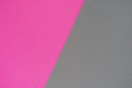 Gray and pink two tone color paper background with stripes. Abstract background modern hipster...
