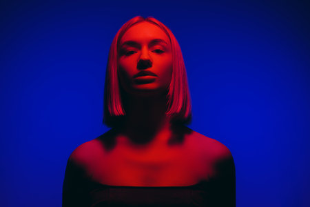 Blond lady on blue backgroundの写真素材