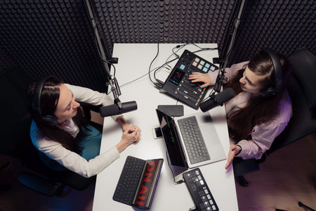 Women talking during podcast recording
