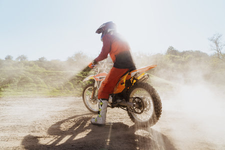 Man riding motorbike on motocross trackの写真素材