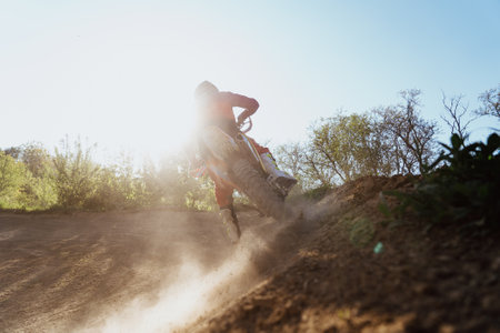 Man riding motorbike on motocross trackの写真素材