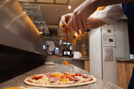 Food concept. Preparing traditional italian pizzaの写真素材