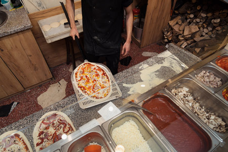 Food concept. Preparing traditional italian pizzaの写真素材