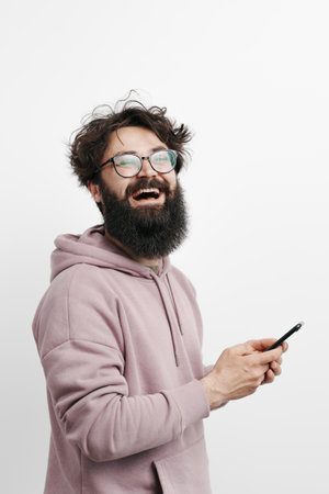 Handsome young man using his phone