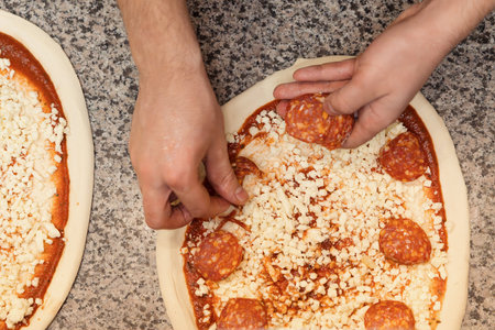 Food concept. Preparing traditional italian pizzaの写真素材