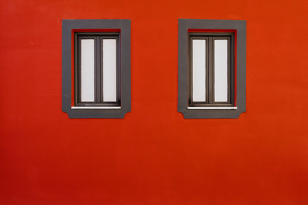 Red Wall with Black Trimmed Windows