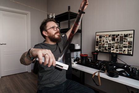 Photographic Journey: Artist Reviewing Negatives