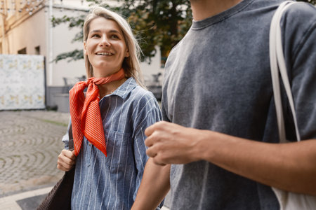 Happy couple enjoying a walk in the city together
