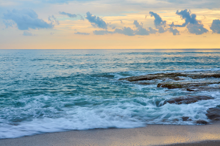 Beautiful tropical sunset on the beach.の写真素材