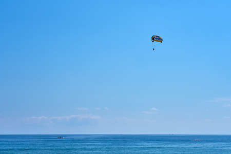 Parasailing on Tropical Beach in summer.の写真素材