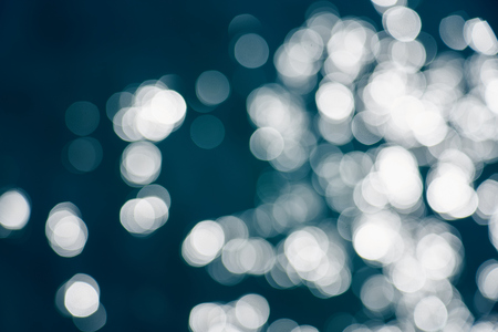 Blue sea water bokeh.の写真素材