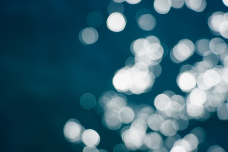 Blue sea water bokeh.の写真素材