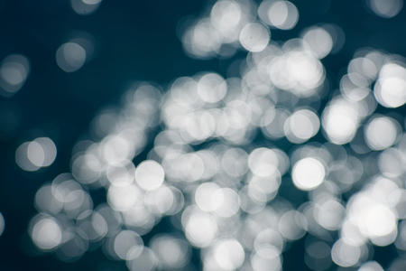 Blue sea water bokeh.の写真素材