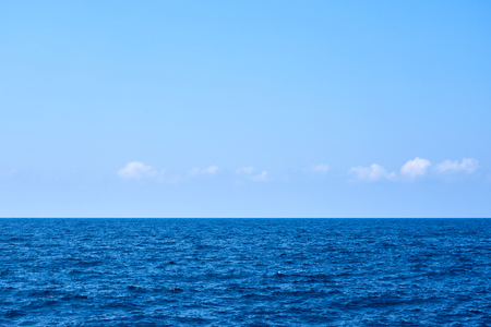 Tropical blue sea and blue sky with clouds.の写真素材
