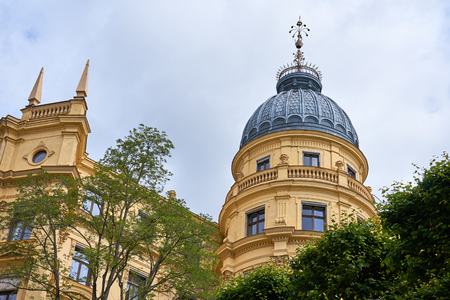A roof of an old building against a cloudy sky. Architecture of Stockholm, Sweden.の写真素材