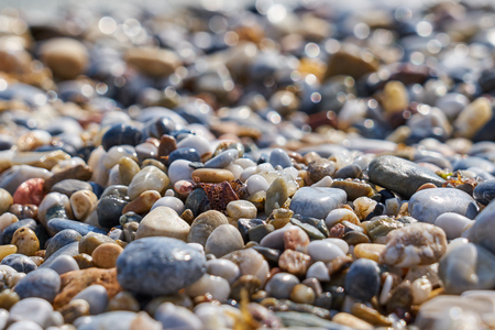 Stone heart. Pebbles on the beach as a natural background.の写真素材