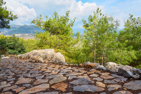 An old medieval granite stone road on mountains in Alanya, Turkey.の写真素材
