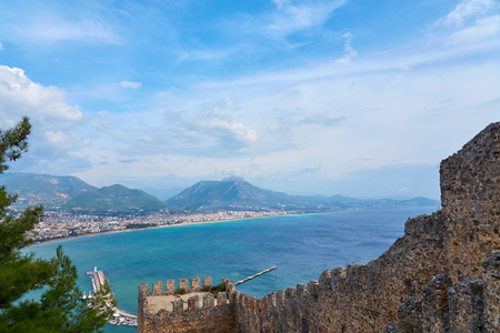 Medieval wall in Alanya, Turkey with cloudy sky.の写真素材