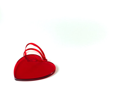 A red glass heart. Valentine's day concept. Copy space.の写真素材