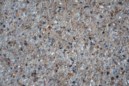 Sand with small tones as a background texture.