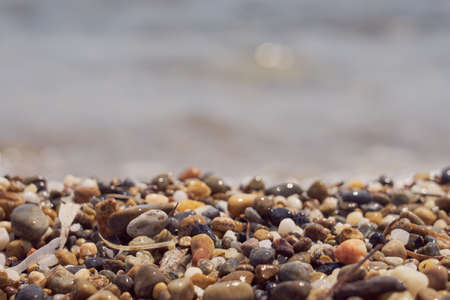 Pebble beach on the coast of Crete on the Aegean Sea