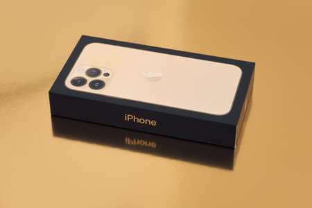 Turku, Finland - September 26, 2021: Box of the new iPhone 13 pro max in goldのeditorial素材