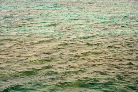 Waves on the surface of the turquoise tropical seaの写真素材
