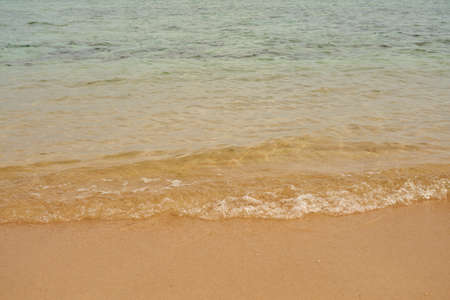 Waves on the tropical sandy beach of the red seaの写真素材