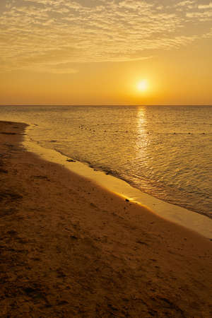The sun rises over the Red Sea at dawnの写真素材