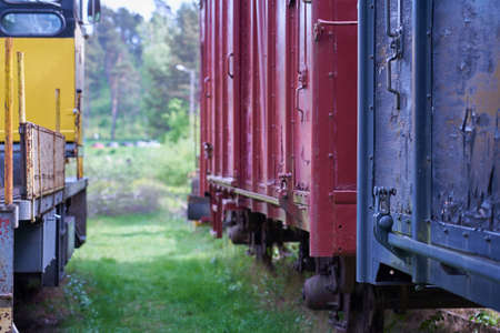 Colorful vintage railroad cars as a backdrop