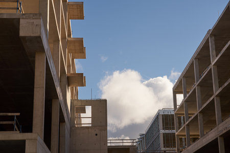 Concrete frames of future buildings at the construction site.