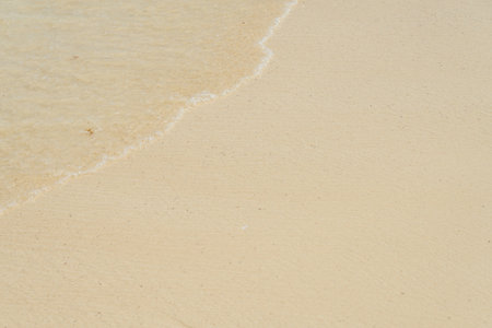 Waves with foam on the Caribbean coast in Mexicoの写真素材