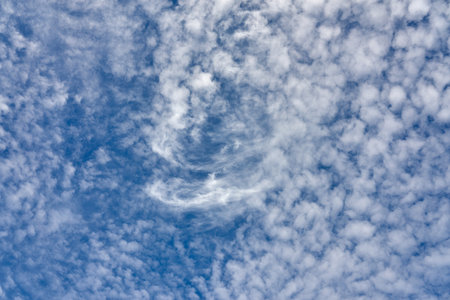 Clouds in a blue sky as a natural backgroundの写真素材