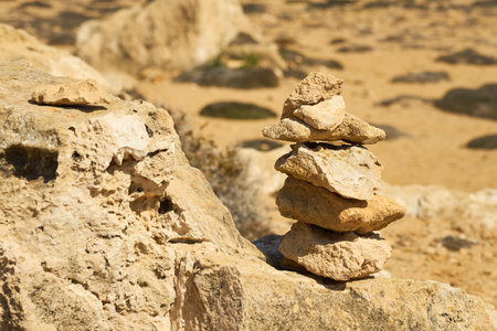 Stones stacked on top of each other with a blurred backgroundの写真素材