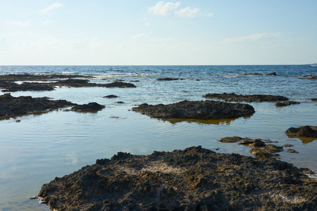 The stone coast of the Mediterranean Sea in Cyprusの写真素材