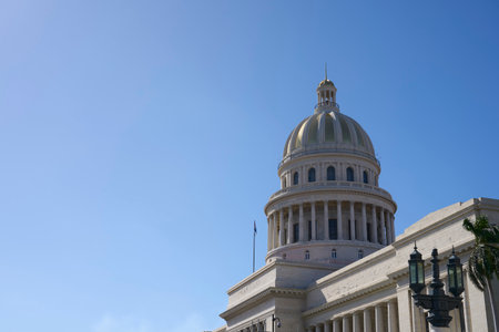The dome of the Capitol in Havana against the backdrop of a clear blue sky.の写真素材