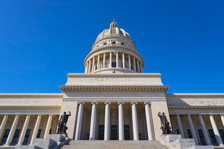 The dome of the Capitol in Havana against the backdrop of a clear blue sky.の写真素材