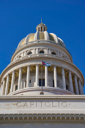 The dome of the Capitol in Havana against the backdrop of a clear blue sky.の写真素材