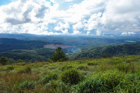 Mountain devastation caused by quarry in the middle of rainforest in Parana State, Brazil.