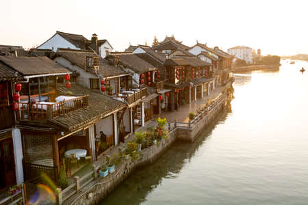 Waterfront of traditional chinese water town Zhujiajiao at sunsetのeditorial素材